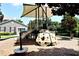 Community playground with shaded play structures at 276 Tavestock Loop, Winter Springs, FL 32708