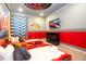 Cars themed bedroom with twin beds and large screen TV at 5887 High Seas Dr, Orlando, FL 32821