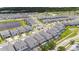 Aerial view of a residential neighborhood with houses and roads at 5887 High Seas Dr, Orlando, FL 32821