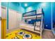 Spongebob-themed bedroom with a bunk bed and rug at 5887 High Seas Dr, Orlando, FL 32821