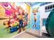 Toy Story themed bedroom with bunk beds and mural at 5887 High Seas Dr, Orlando, FL 32821
