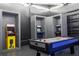 Basement game room featuring air hockey and arcade games at 5887 High Seas Dr, Orlando, FL 32821
