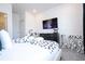 King-size bed, TV, and Dalmatian theme decor at 5887 High Seas Dr, Orlando, FL 32821