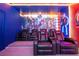 Home theater with projector, screen, and reclining seats at 5887 High Seas Dr, Orlando, FL 32821