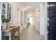 Bright and spacious entryway with tile floors and a console table at 5887 High Seas Dr, Orlando, FL 32821