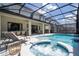 Relaxing backyard oasis featuring a refreshing pool and a soothing spa at 5887 High Seas Dr, Orlando, FL 32821