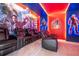 Home theater with reclining seats and Avengers theme at 5887 High Seas Dr, Orlando, FL 32821