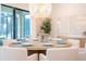 Elegant dining room featuring a large round table and chandelier at 5887 High Seas Dr, Orlando, FL 32821