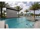 Resort-style pool with a relaxing waterfall feature at 5887 High Seas Dr, Orlando, FL 32821