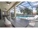 Covered patio with large dining table, perfect for outdoor entertaining at 5887 High Seas Dr, Orlando, FL 32821