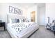 Main bedroom with king-size bed and en-suite bathroom at 5887 High Seas Dr, Orlando, FL 32821