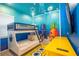 Spongebob-themed bedroom with a bunk bed and TV at 5887 High Seas Dr, Orlando, FL 32821