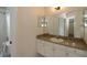 Bathroom with granite countertop and a shower/tub combo at 276 Tavestock Loop, Winter Springs, FL 32708