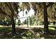 playground nestled under shady oak trees at 276 Tavestock Loop, Winter Springs, FL 32708