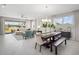 Bright and spacious dining area with access to the kitchen and Gathering room at 12934 Promise Pl, Orlando, FL 32832