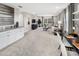 Spacious loft area with sectional sofa and media console at 12934 Promise Pl, Orlando, FL 32832