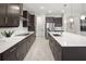 Modern kitchen with large island and walk-in pantry at 12934 Promise Pl, Orlando, FL 32832