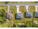 Aerial view of homes showcasing different roof styles and lot sizes at 602 Marion Oaks Blvd, Ocala, FL 34473