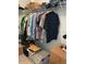 Walk-in closet with hanging clothes and shelving at 5639 Costa Blanca Way, Davenport, FL 33897