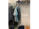 Walk-in closet with hanging clothes and additional shelving at 5639 Costa Blanca Way, Davenport, FL 33897