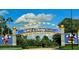 The entrance to Walt Disney World with Mickey and Minnie Mouse at 5639 Costa Blanca Way, Davenport, FL 33897