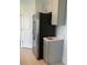 Stainless steel refrigerator in modern kitchen at 5639 Costa Blanca Way, Davenport, FL 33897