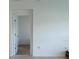 Open doorway to a bedroom from living room at 5639 Costa Blanca Way, Davenport, FL 33897