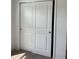 Large bedroom closet with sliding doors and ample storage space at 5639 Costa Blanca Way, Davenport, FL 33897