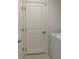 Bright laundry room with washer and dryer hookups and white cabinetry at 5639 Costa Blanca Way, Davenport, FL 33897