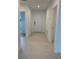 Foyer with tile flooring and doors leading to other rooms at 5639 Costa Blanca Way, Davenport, FL 33897