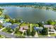 Aerial view of lakefront property with neighborhood context at 170 Spring Lake Hills Dr, Altamonte Springs, FL 32714