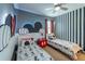 Mickey Mouse themed bedroom with twin beds, perfect for  at 7432 Marker Ave, Kissimmee, FL 34747