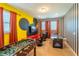 Fun game room with foosball, air hockey, and TV at 7432 Marker Ave, Kissimmee, FL 34747
