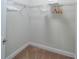 Walk-in closet with ample shelving and hanging space at 7432 Marker Ave, Kissimmee, FL 34747