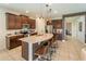 Modern kitchen with stainless steel appliances and an island at 7432 Marker Ave, Kissimmee, FL 34747