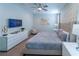 Spacious Primary bedroom with king-size bed and TV at 7432 Marker Ave, Kissimmee, FL 34747