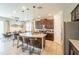 Modern kitchen with stainless steel appliances and an island at 7432 Marker Ave, Kissimmee, FL 34747
