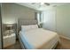 Bright bedroom with a comfortable queen-size bed and ample closet space at 7432 Marker Ave, Kissimmee, FL 34747