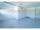 Spacious two-car garage with painted floor and automatic opener at 7432 Marker Ave, Kissimmee, FL 34747