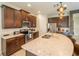 Modern kitchen with stainless steel appliances and an island at 7432 Marker Ave, Kissimmee, FL 34747