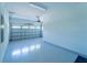 Spacious garage with ample storage shelving at 7432 Marker Ave, Kissimmee, FL 34747