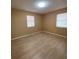 Spacious bedroom featuring light walls and wood-look flooring at 608 N Summerlin Ave, Orlando, FL 32803