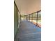 Screened porch with wood deck overlooking backyard at 608 N Summerlin Ave, Orlando, FL 32803