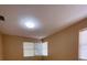 Bright bedroom with light walls and laminate wood flooring at 608 N Summerlin Ave, Orlando, FL 32803
