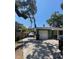Green house with a one car garage and driveway at 608 N Summerlin Ave, Orlando, FL 32803