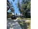 House exterior with large trees and a driveway at 608 N Summerlin Ave, Orlando, FL 32803