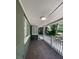 Charming front porch with white railing and tile flooring at 608 N Summerlin Ave, Orlando, FL 32803