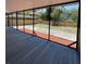 Screened porch with wood deck overlooking fenced yard at 608 N Summerlin Ave, Orlando, FL 32803
