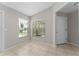 Bright and airy entryway with tile floors and neutral walls at 4704 Cheyenne Point Trl, Kissimmee, FL 34746