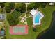 Community features a tennis court, pool, and open green space at 4704 Cheyenne Point Trl, Kissimmee, FL 34746